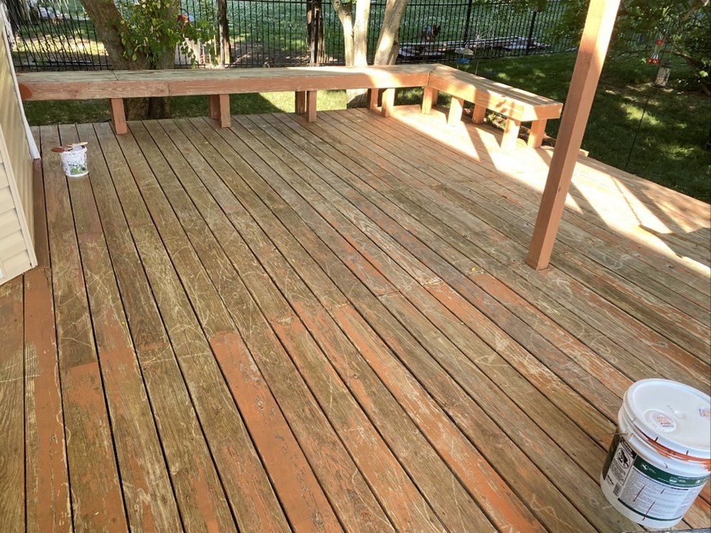 Weathered, faded wood deck before staining