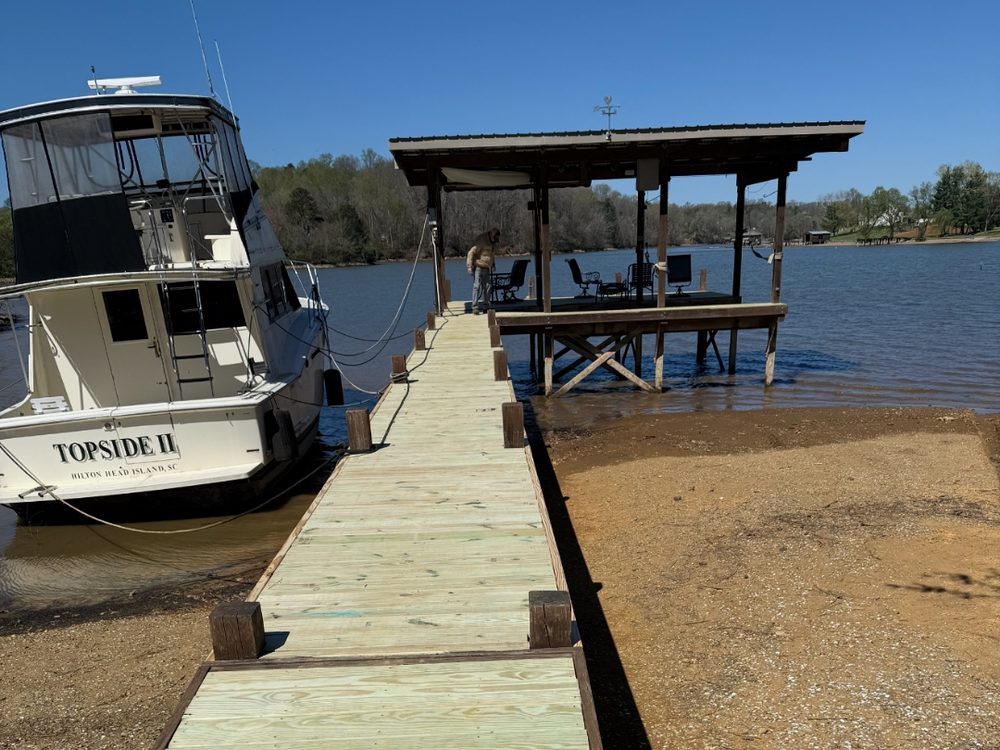 Rebuilt lakefront dock walkway with new pressure treated decking