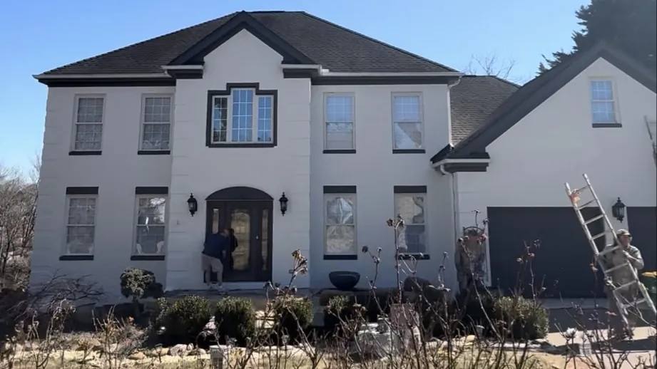 Two-story East Tennessee home after a full exterior repaint by Clark's Home Solutions